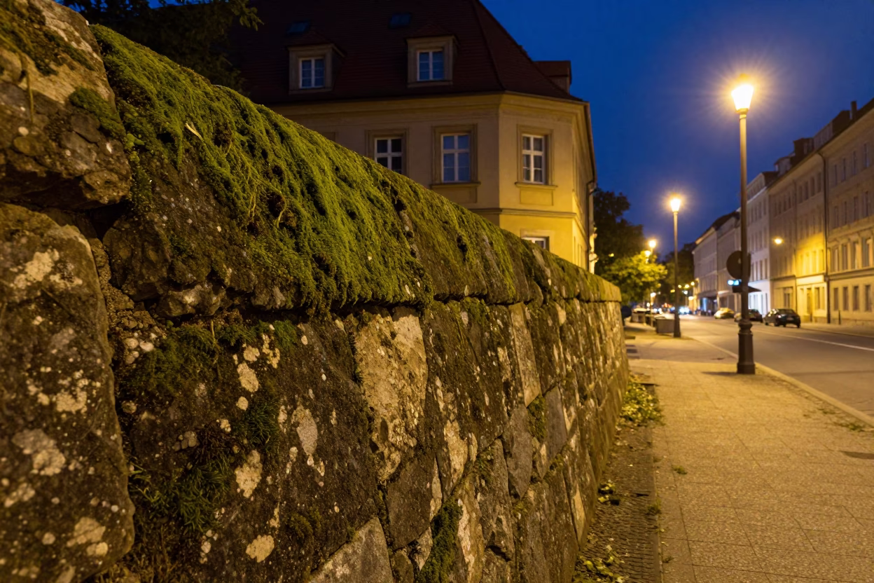 Berlin Midnight Street Scene with Mossy Stone Wall and Construction Underpass in in Berlin, Germany