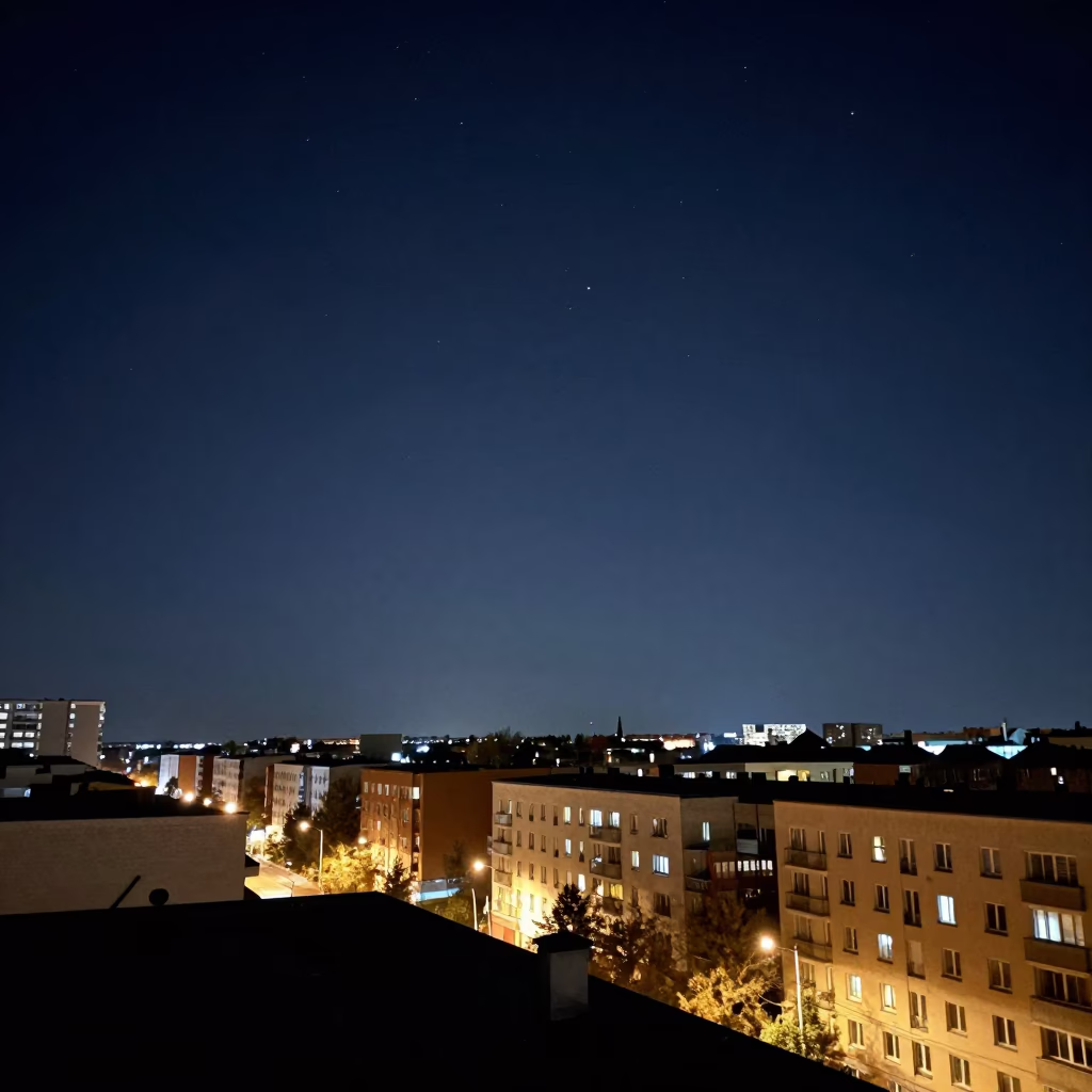 Berlin Night Sky Over Urban Rooftops and Streetlamp Illumination in in Berlin, Germany