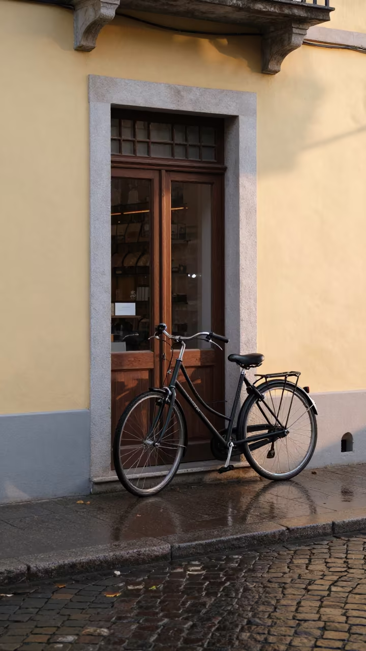 Bicycle Against Bakery at Dawn in Rimini in across a remote ferry crossing near Rimini
