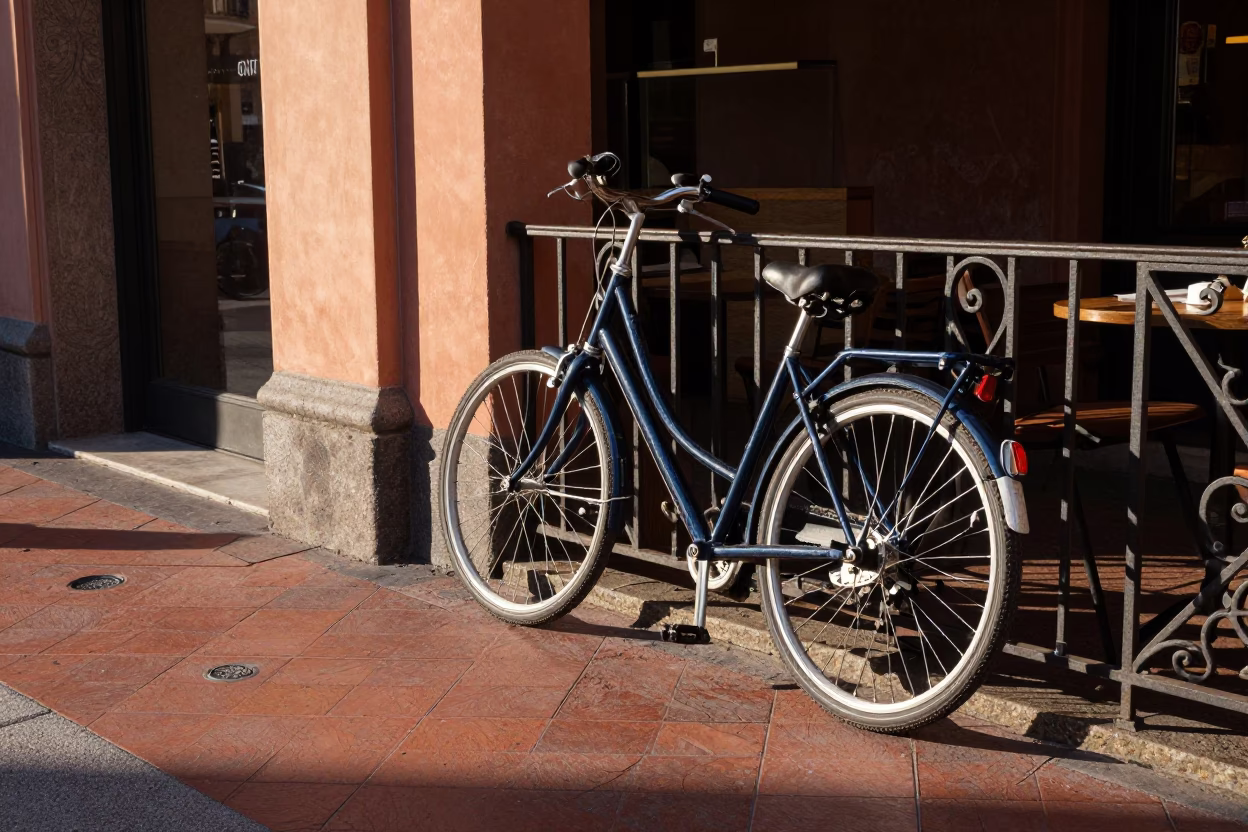 Bicycle Leaning Against Cafe in Bologna Late Afternoon Light in in Bologna, Italy