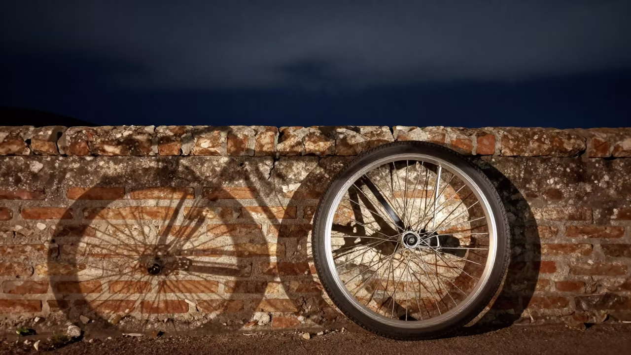 Bicycle Wheel Shadows on Corsican Brick at Night in in Corsica