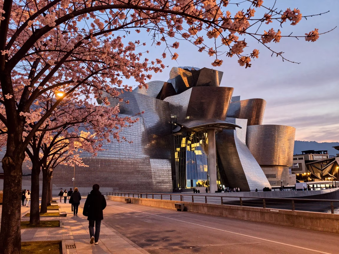 Bilbao Evening Street Scene with Cherry Trees and Steel Architecture in Copper Light in in Bilbao, Spain