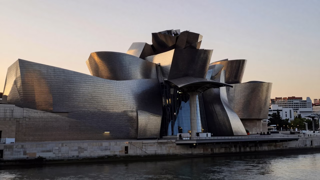 Bilbao Nautical Dawn Light on Guggenheim Museum Titanium Cladding and Nervion River Reflections in in Bilbao, Spain