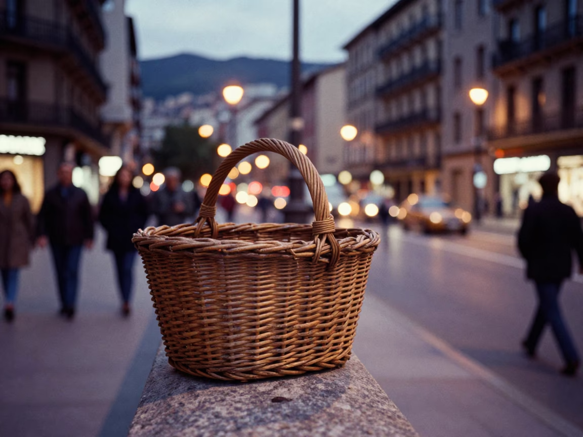 Bilbao Spain Evening Street Scene with Wicker Basket and City Lights in in Bilbao, Spain
