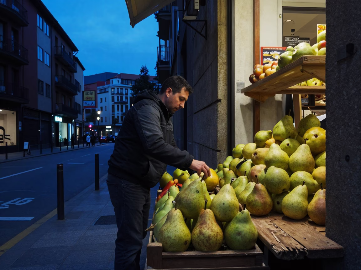 Bilbao Spain indigo twilight street scene with pears and nicked wood shelf in in Bilbao, Spain