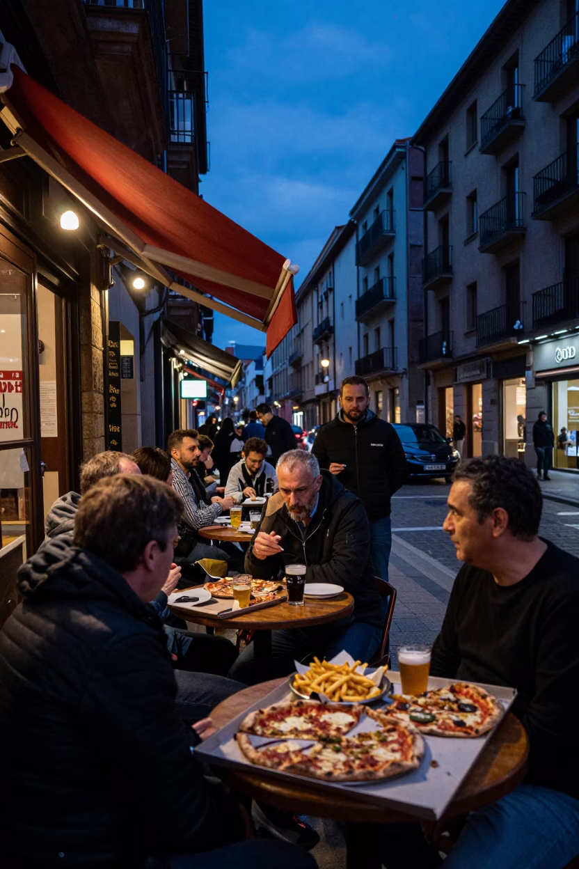 Bilbao Spain Indigo Twilight Street Scene with Pizza and Frites in in Bilbao, Spain