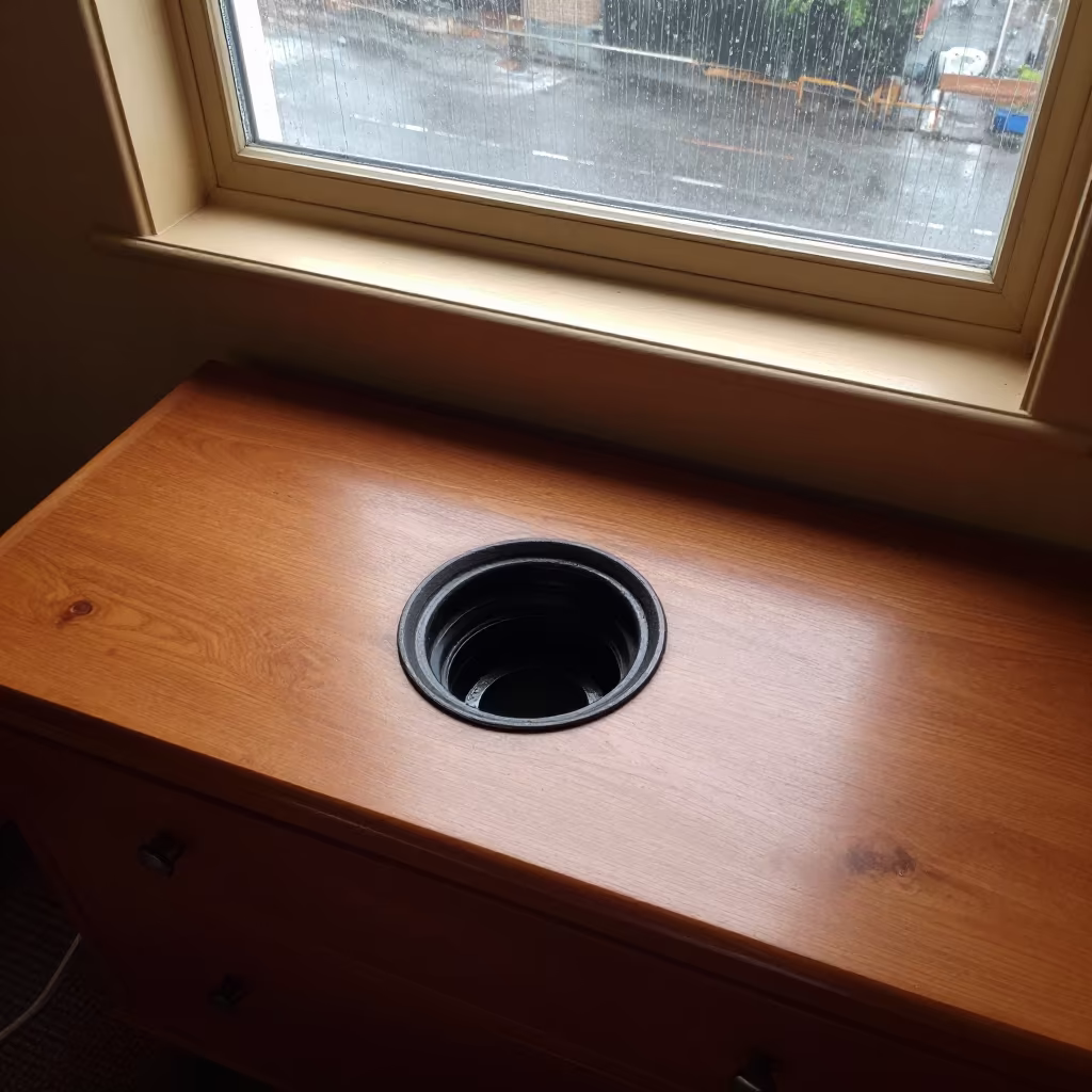 Black Smoker Vent on Hotel Dresser Chingola in on a hotel dresser near Chingola