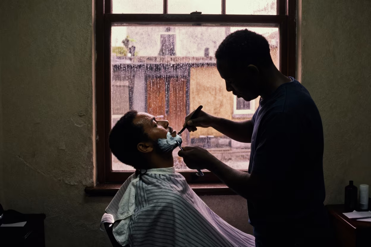 Blantyre Barber Shaving Silhouette Evening in in the old quarter in Blantyre