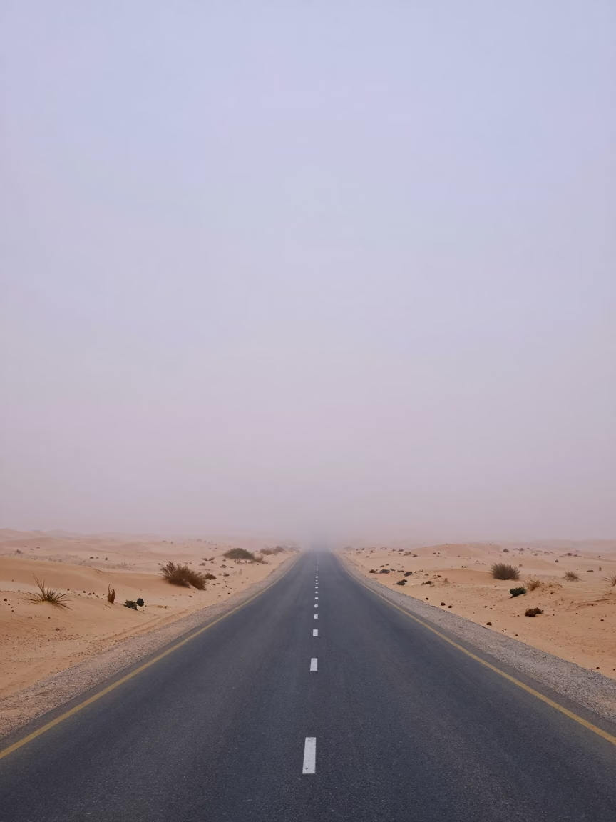 Blizzard Curtain Over Desert Road Near Muscat in through low marine fog near Muscat