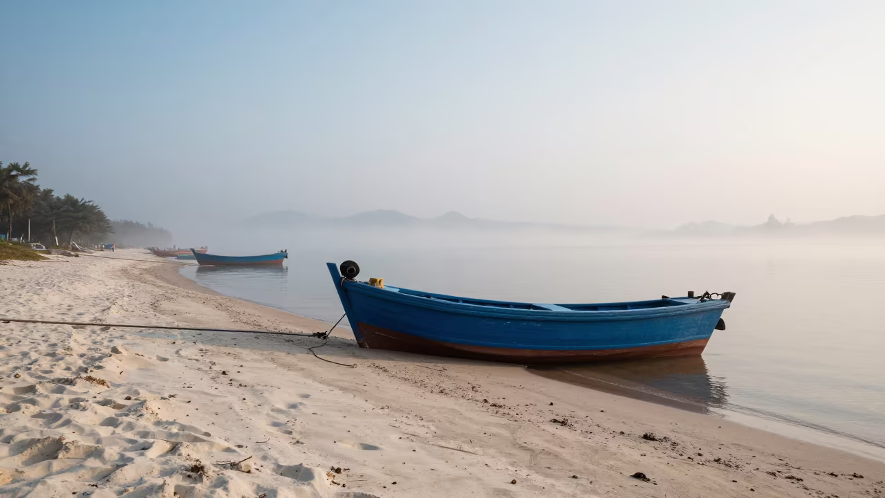 Blue Fishing Boat on White Sand at Foggy Ningbo in beside a fogbound harbor mouth near Ningbo