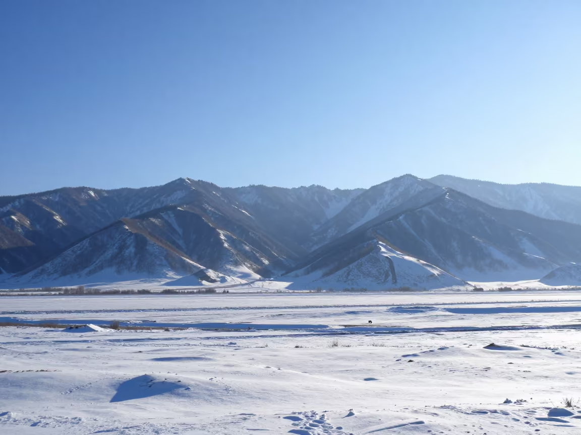 Blue Haze Layered Mountain Ridges Almaty Winter in across a floodplain after rain near Almaty