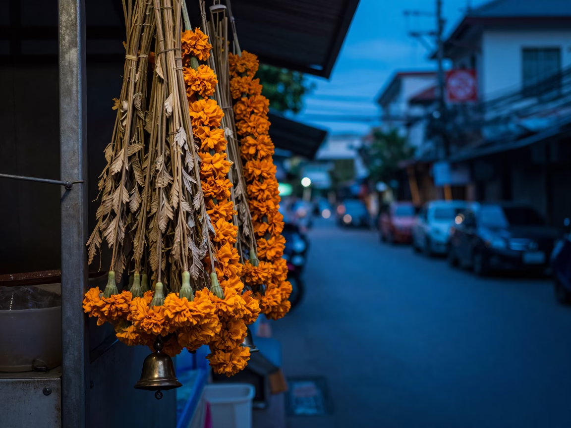 Blue Hour Bangkok Street Scene With Dried Flowers And Bell in in Bangkok, Thailand