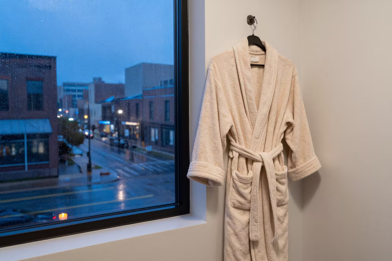 Blue Hour Bathrobe by Rainy Window Kansas City in beside a rain-streaked window in Kansas City