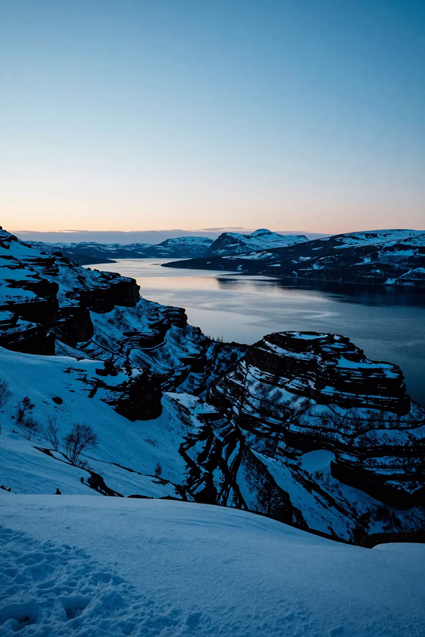 Blue Hour Cedar Valley Snow Traces After Sunset in from a ridge above layered foothills in Sweden