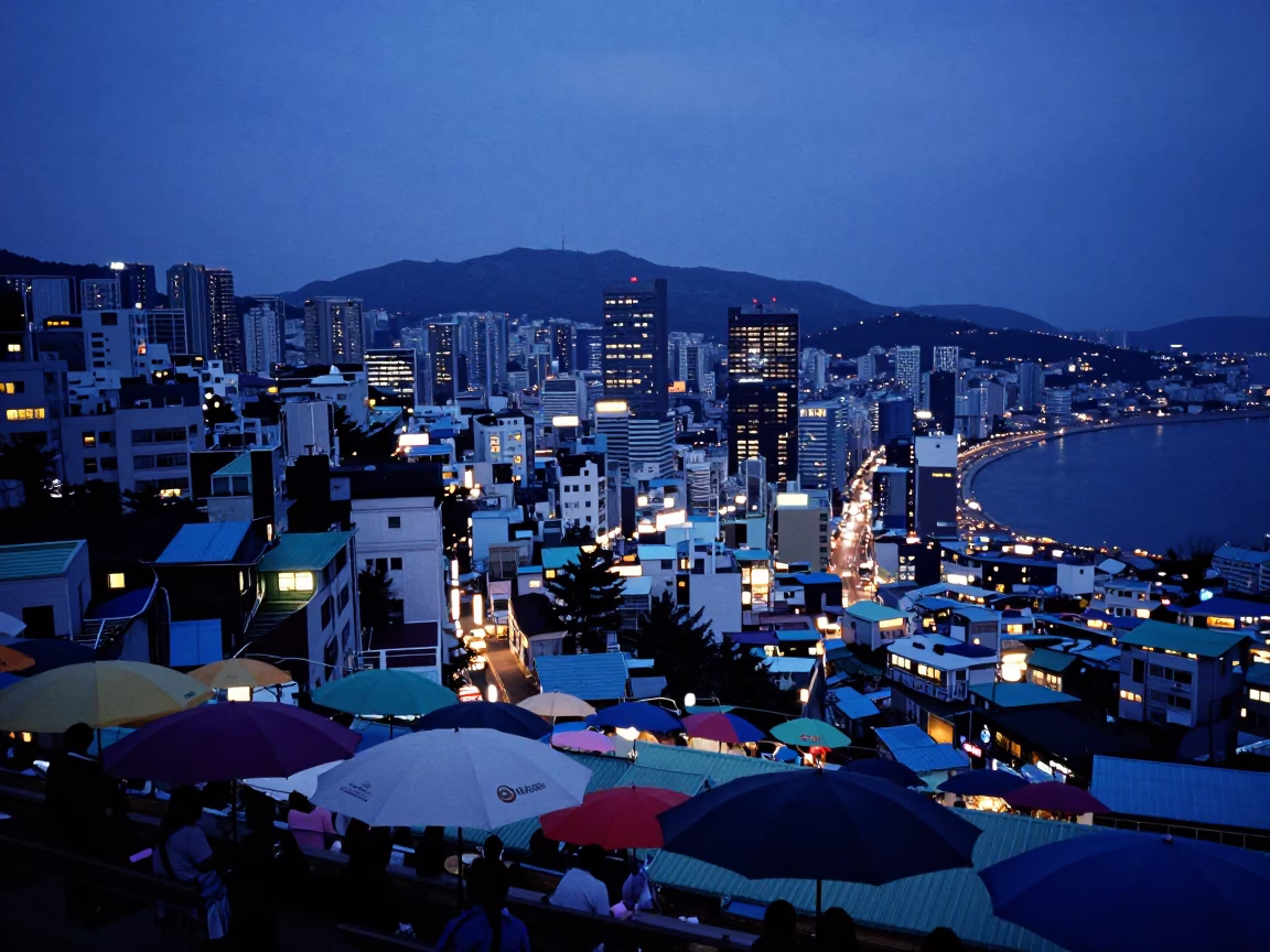 Blue Hour Cityscape of Busan South Korea with Umbrellas and Street Life in in Busan, South Korea