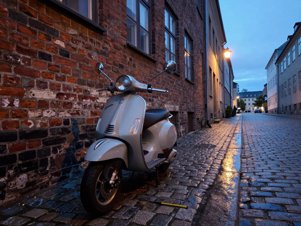 Blue Hour Copenhagen Street Scene with Vintage Vespa and Cobblestone Lane in in Copenhagen, Denmark