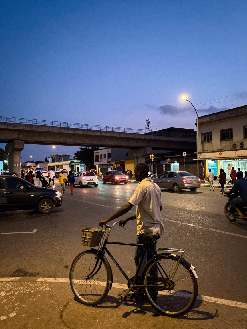 Blue Hour Dakar Street Scene with Bicycle and Busy Overpass Intersection in in Dakar, Senegal