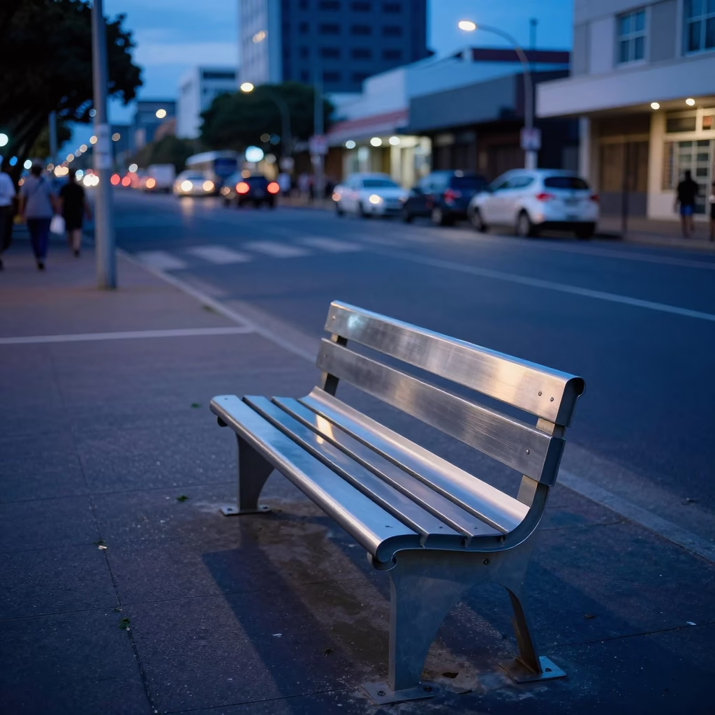 Blue Hour Durban Street Scene with Brushed Steel Bench and Urban Shadows in in Durban, South Africa