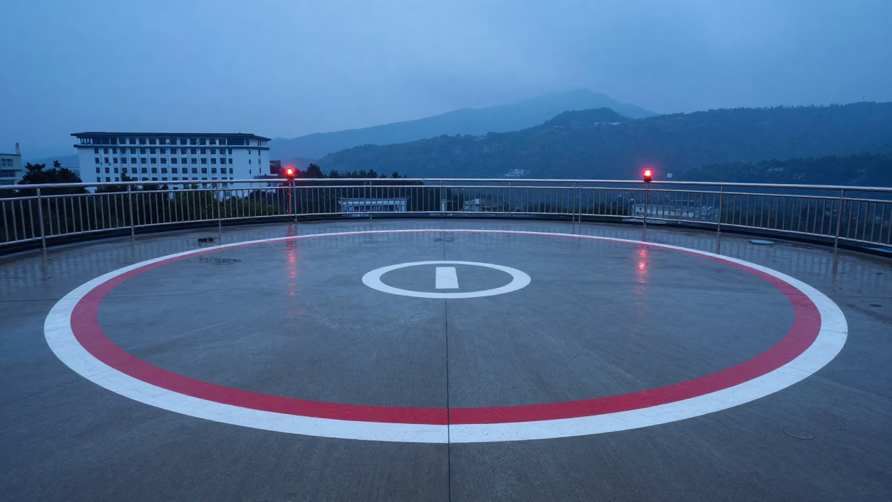 Blue Hour Hospital Helipad After Sleet in Zhangjiajie in beside a marked medical landing pad in Zhangjiajie