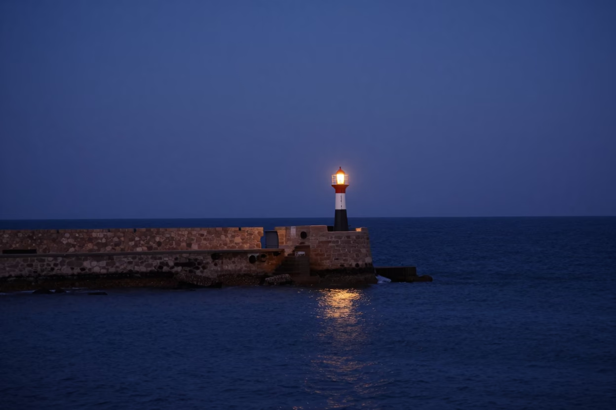 Blue Hour in Essaouira Morocco Harbor Breakwater Beacon and Coastal Life in in Essaouira, Morocco