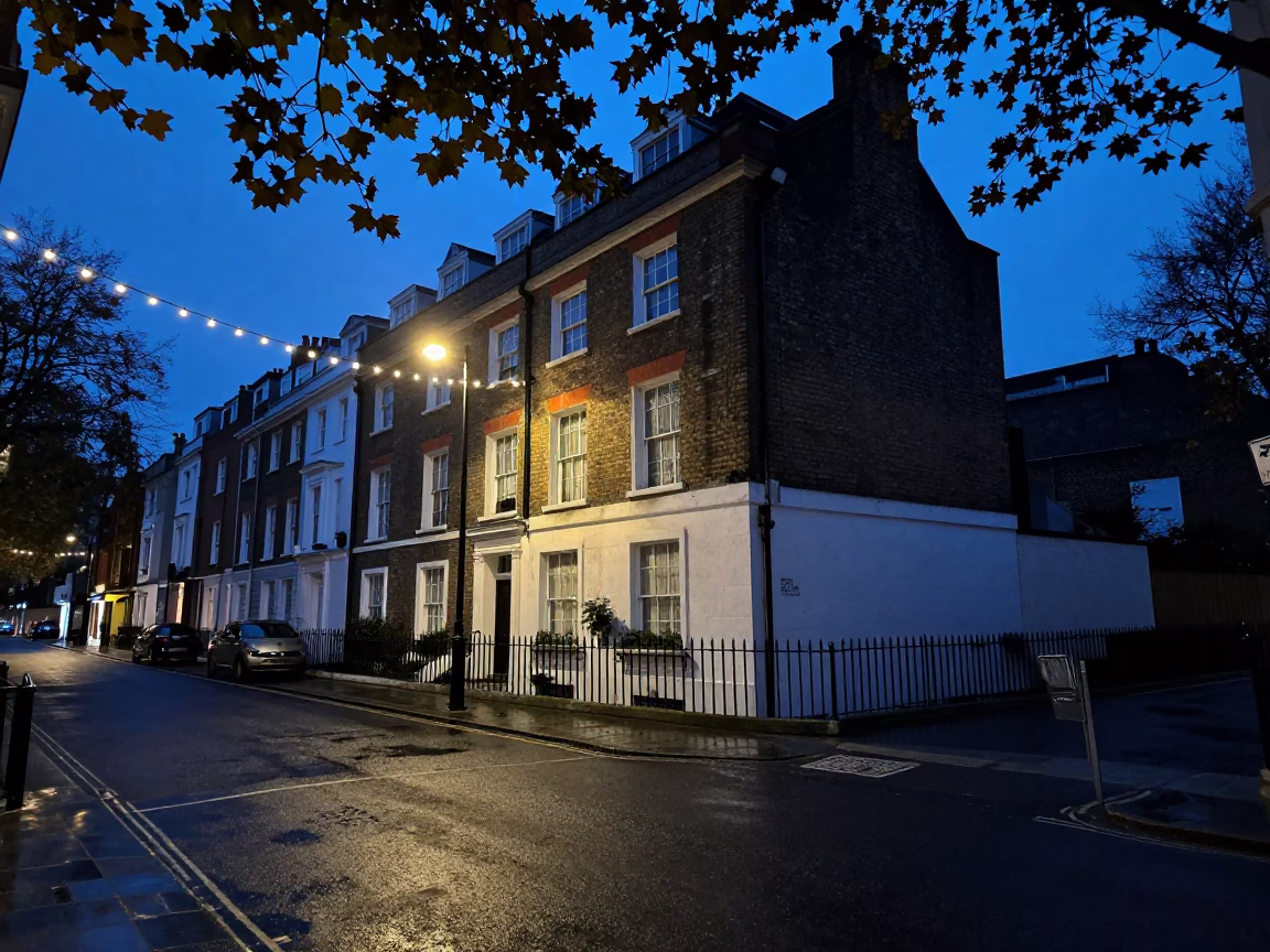 Blue Hour London Street Scene With String Lights And Leaf Shadows On Window Glass in in London, United Kingdom