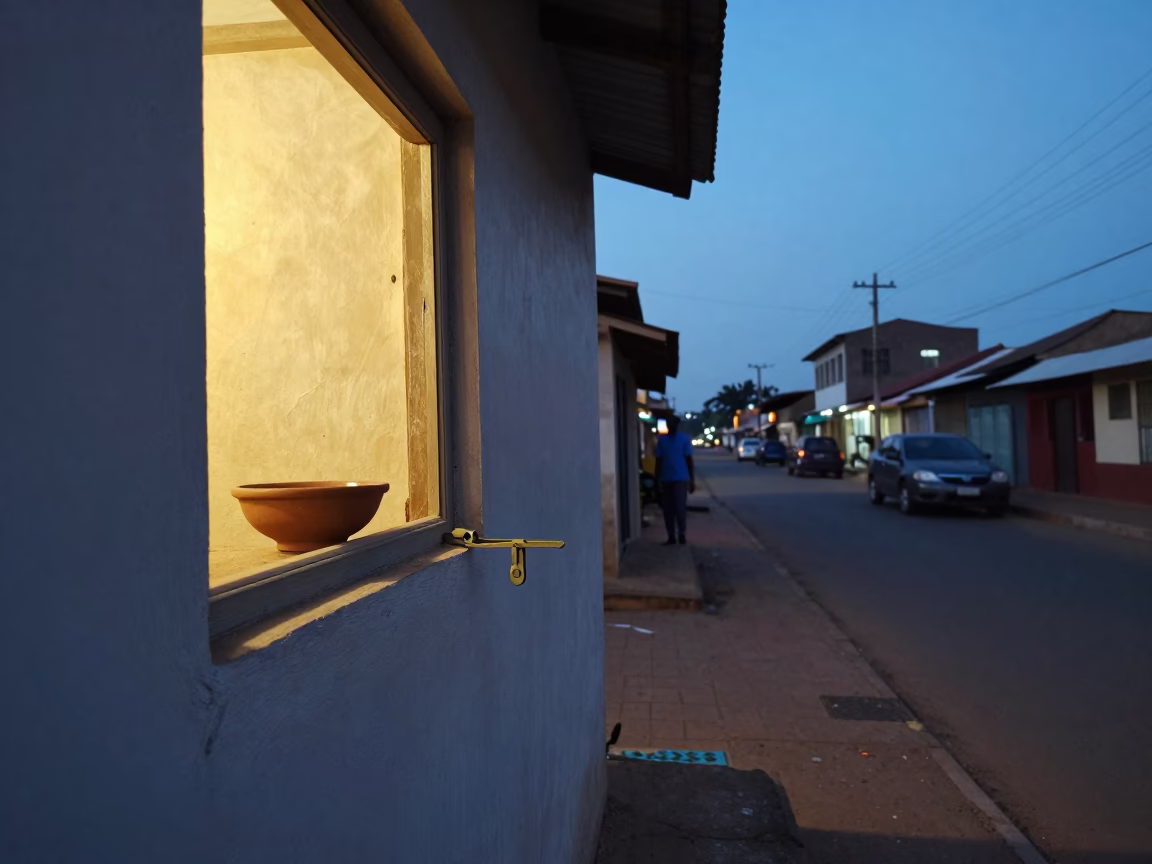 Blue Hour Street Scene in Accra Ghana with Window Light and Door Latch in in Accra, Ghana