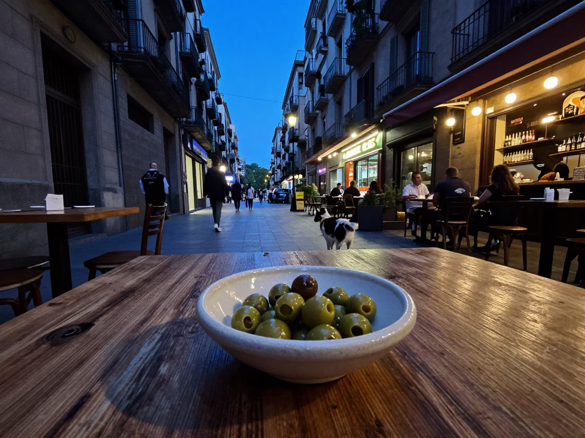 Blue Hour Street Scene in Barcelona with Ceramic Olive Dish and Dog in in Barcelona, Spain
