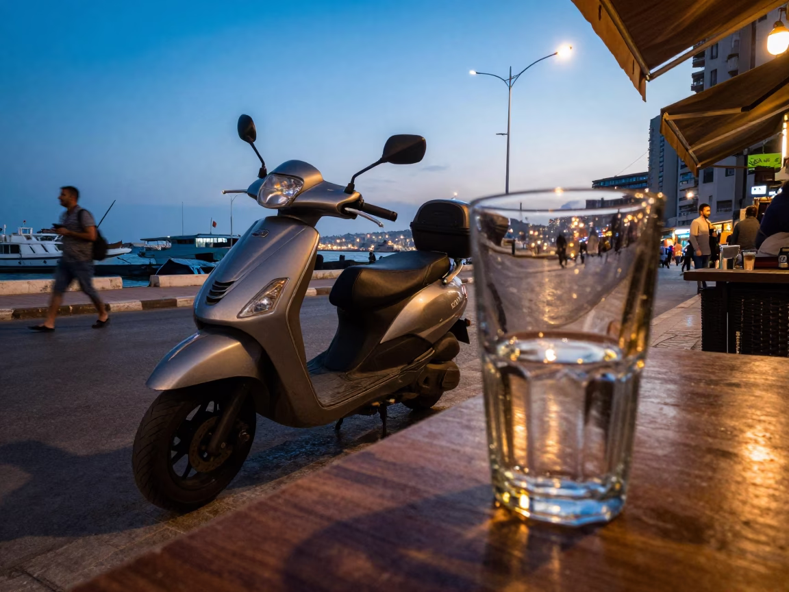 Blue Hour Street Scene in Beirut Lebanon with Scooter and Glass Tumbler in in Beirut, Lebanon