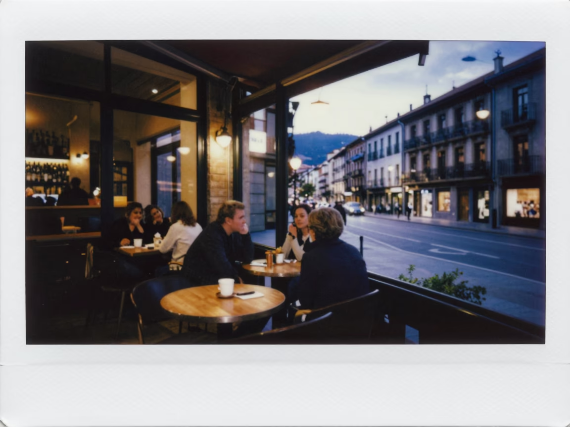 Blue Hour Street Scene in Bilbao Spain with Warm Cafe Interior and Local Diners in in Bilbao, Spain