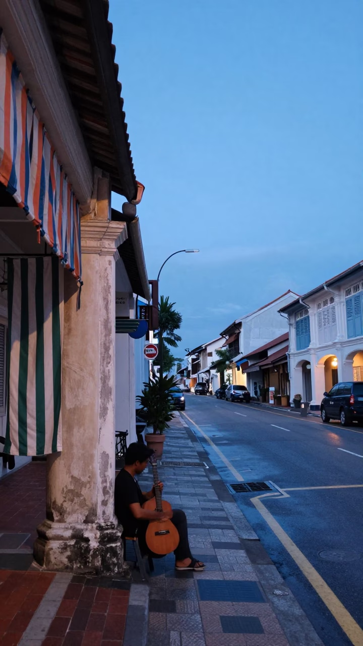 Blue Hour Street Scene in George Town Malaysia with Striped Fabric and Guitar in in George Town, Malaysia