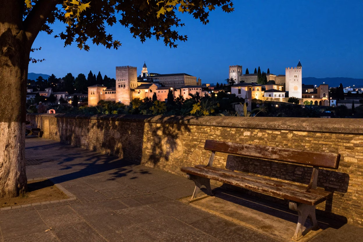 Blue Hour Street Scene in Granada Spain with Park Bench and Leaf Shadows in in Granada, Spain