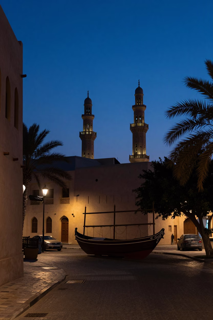 Blue Hour Street Scene in Muscat Oman with Dhow Silhouette and Traditional Architecture in in Muscat, Oman