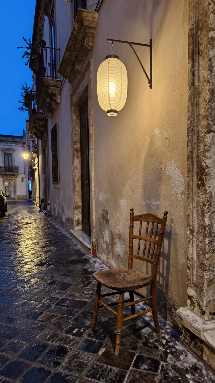 Blue Hour Street Scene in Palermo Italy with Spindle Chair and Paper Lantern in in Palermo, Italy