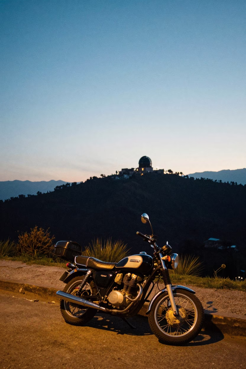 Blue Hour Street Scene in Quito Ecuador with Motorcycle Overlook and Observatory Silhouette in in Quito, Ecuador