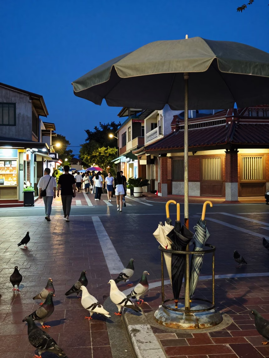Blue Hour Street Scene in Tainan Taiwan with Pigeons and Umbrella Stand in in Tainan, Taiwan