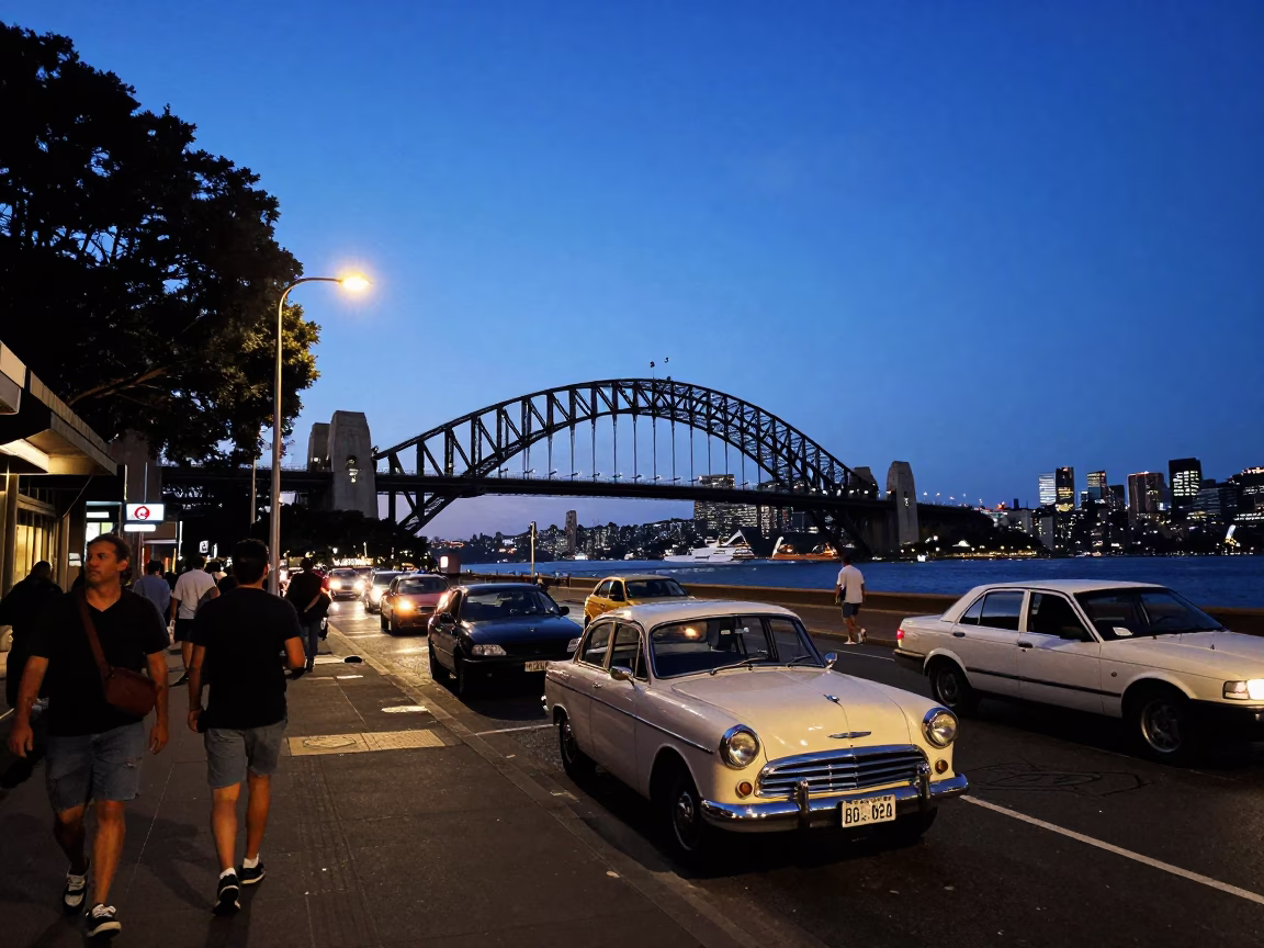 Blue Hour Sydney Street Scene with Vintage Cars and Pedestrians Near Harbour Bridge in in Sydney, New South Wales, Australia