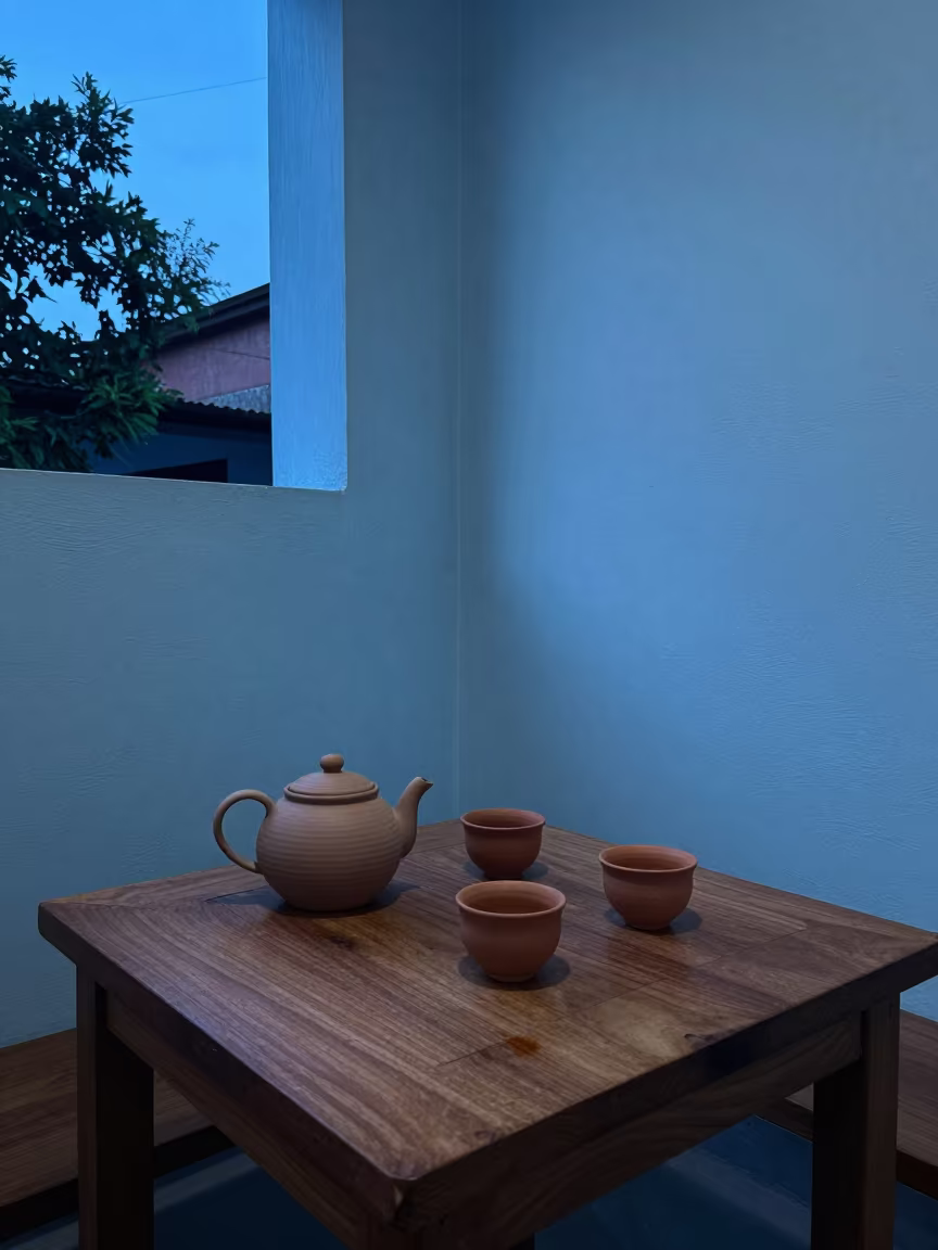 Blue Hour Teapot and Cups in Dhaka Nook in in a breakfast nook near Dhaka