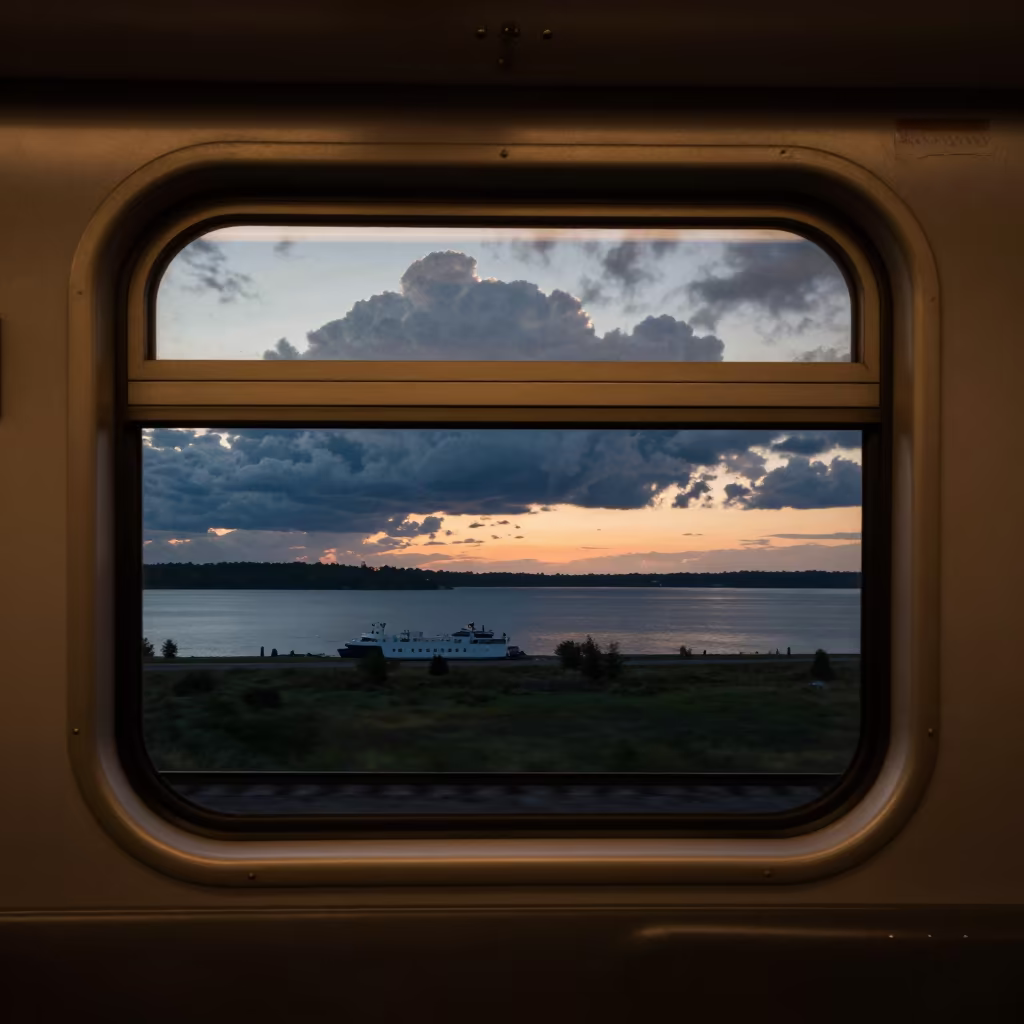 Blue Hour Train Car Window Silhouette in across a remote ferry crossing in New Jersey
