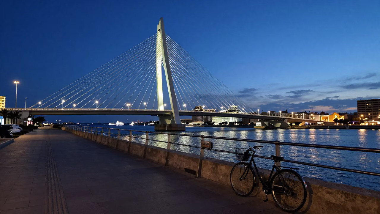 Blue Hour Valencia Harbor Scene with Illuminated Bridge and Bicycle Basket in in Valencia, Spain