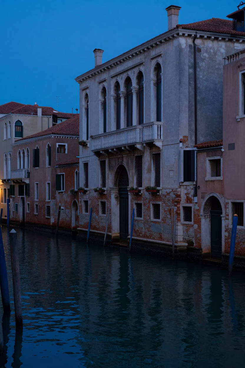 Blue Hour Venice Canal Scene with Window Boxes and Traditional Architecture in in Venice, Italy