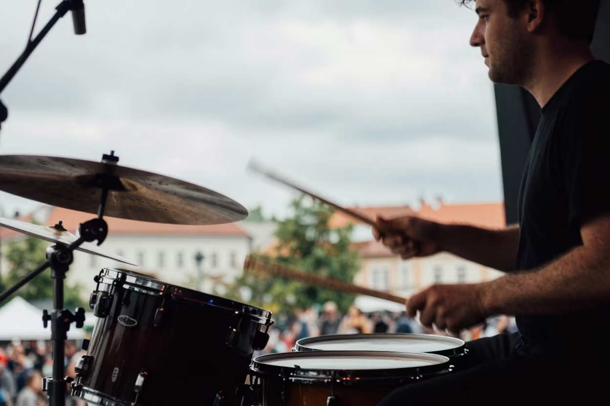Blurred Drummer Sticks in Bratislava Concert in on a dimly lit stage in Bratislava