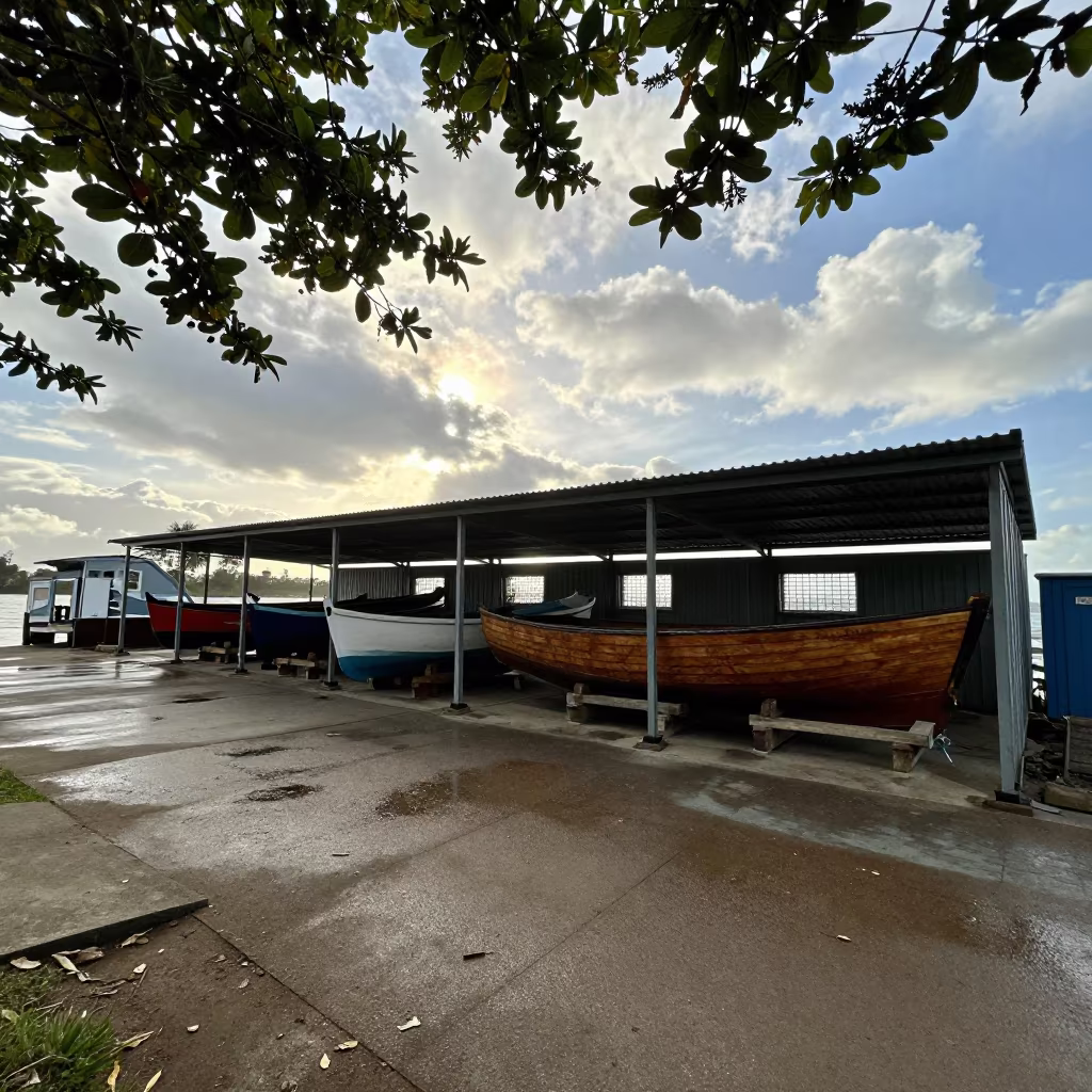 Boat Painting Shed Hulls Near Moçâmedes Ferry in across a remote ferry crossing near Moçâmedes