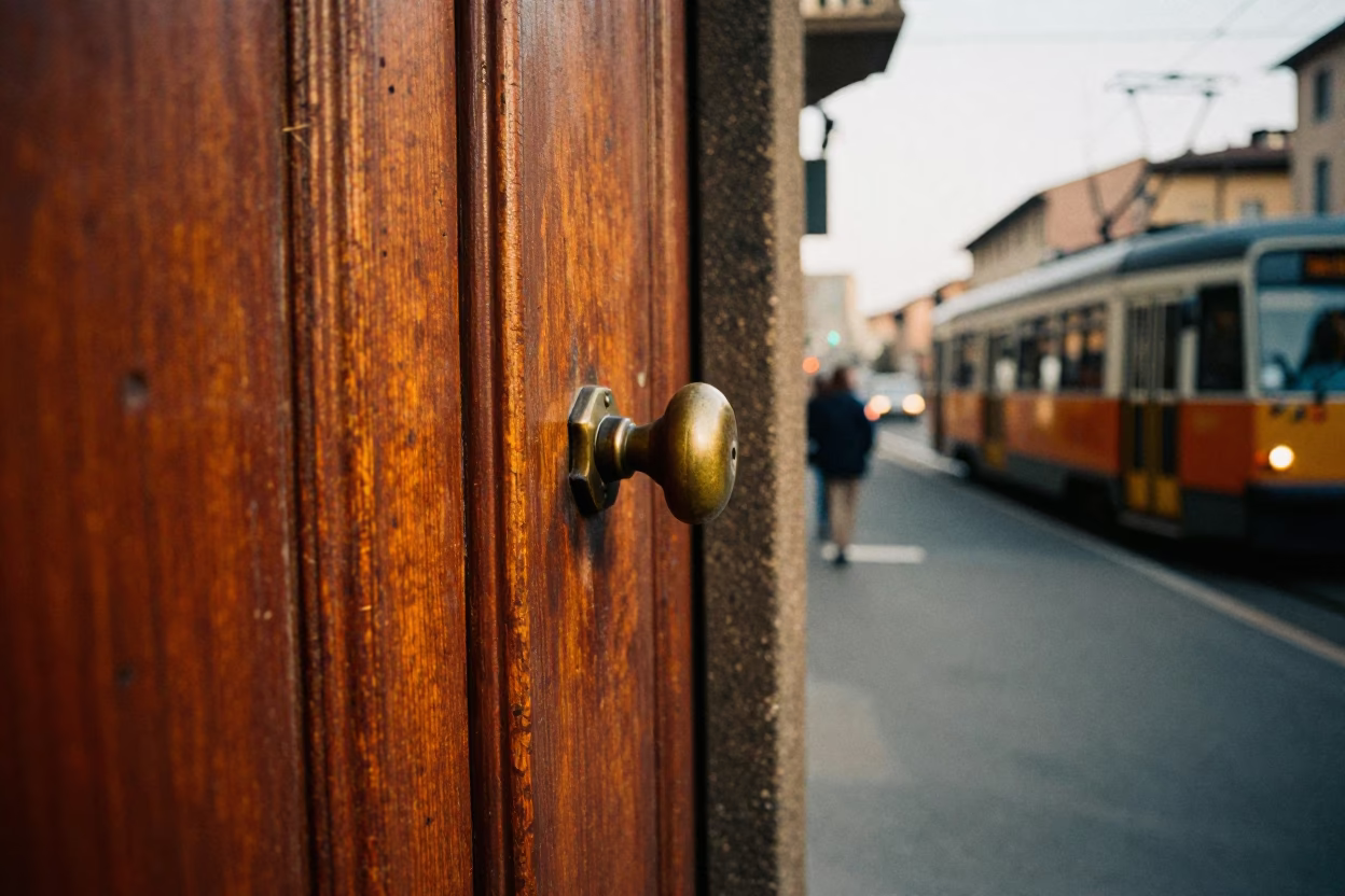 Bologna Evening Street Scene with Doorknob and Tram in Honeyed Light in in Bologna, Italy