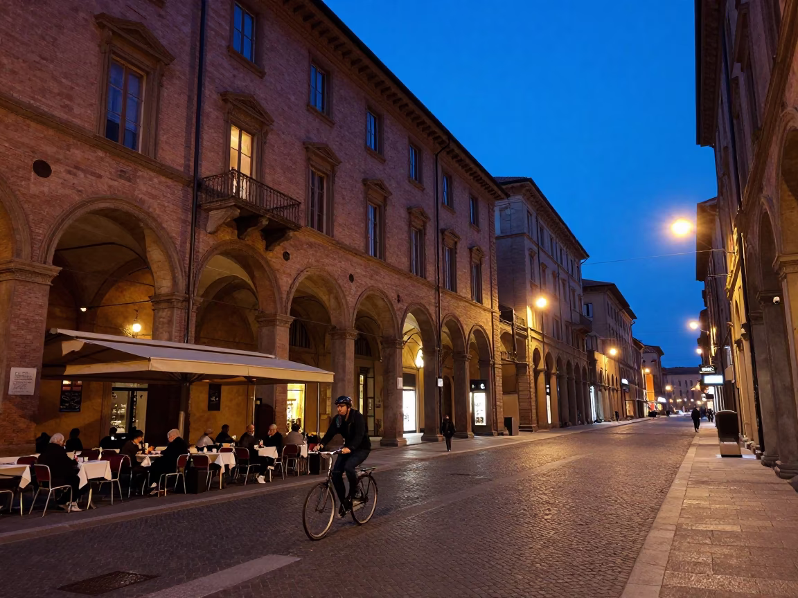 Bologna evening twilight street scene with historic architecture and local life in in Bologna, Italy