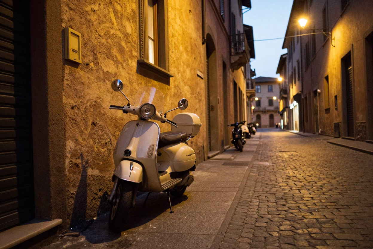 Bologna Italy Evening Street Scene with Vintage Motorcycle and Glass Decanter in in Bologna, Italy