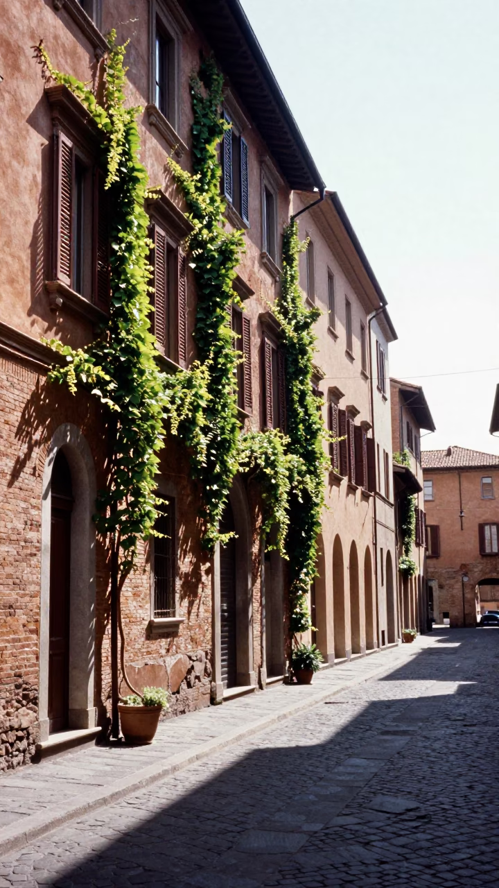Bologna Italy midmorning street scene with ivy vines and narrow gauge train in in Bologna, Italy
