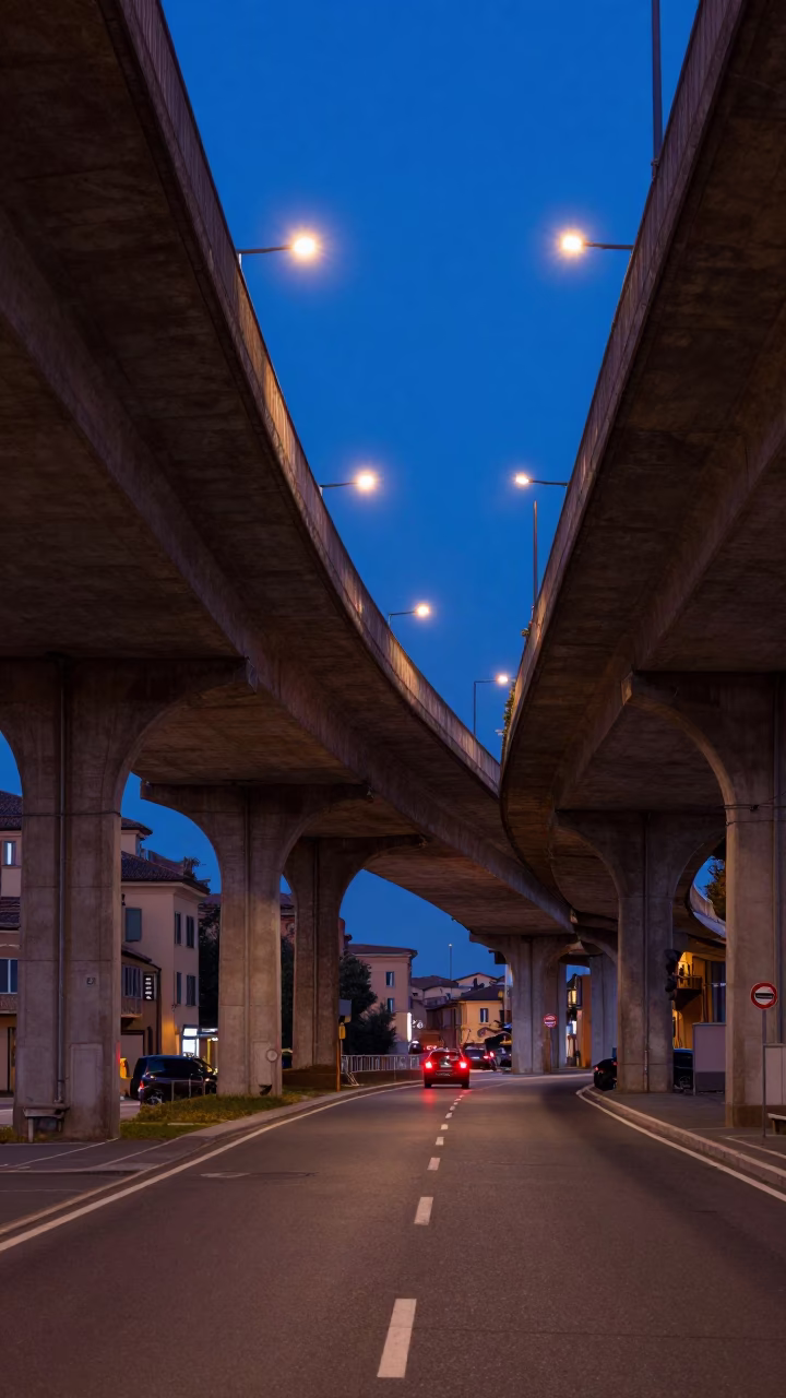 Bologna Italy Nautical Dawn Street Scene with Overpass and Taillight Streaks in in Bologna, Italy