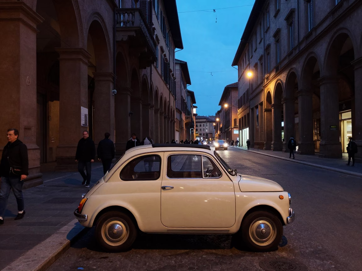Bologna Italy twilight street scene with vintage car and pedestrians in in Bologna, Italy