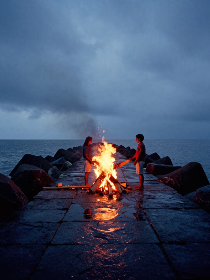 Bonfire on Iquitos Breakwater Before Dawn in from a moonlit breakwater near Iquitos
