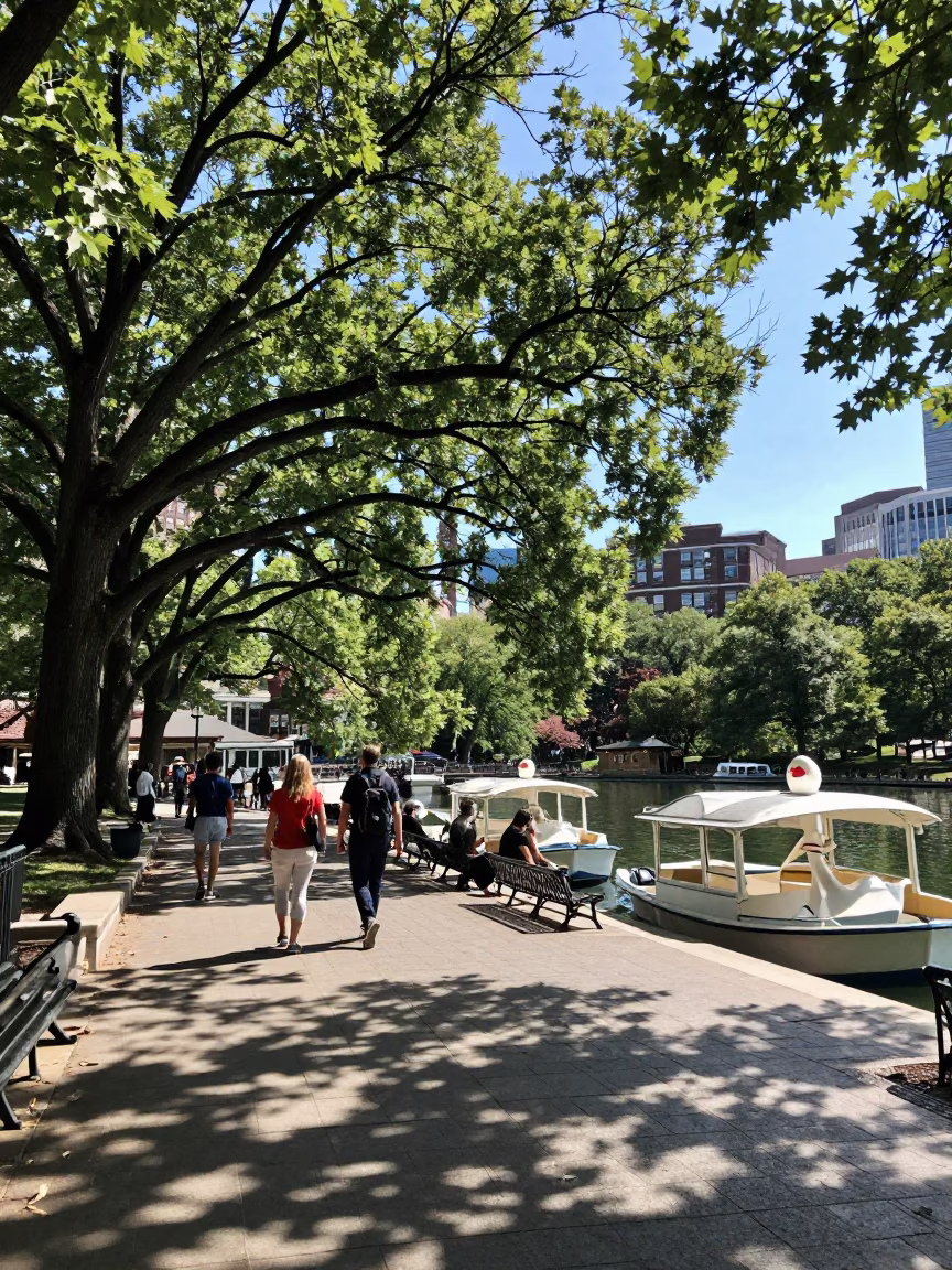 Boston Common Noon Sunlight Pedestrians Walking Near Swan Boats on Park Lake in in Boston, Massachusetts, United States